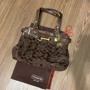 Coach brown purse with gold accents
